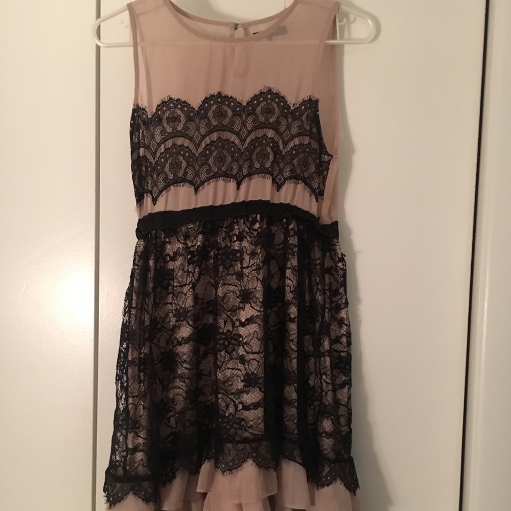 Black lace and nude cocktail dress